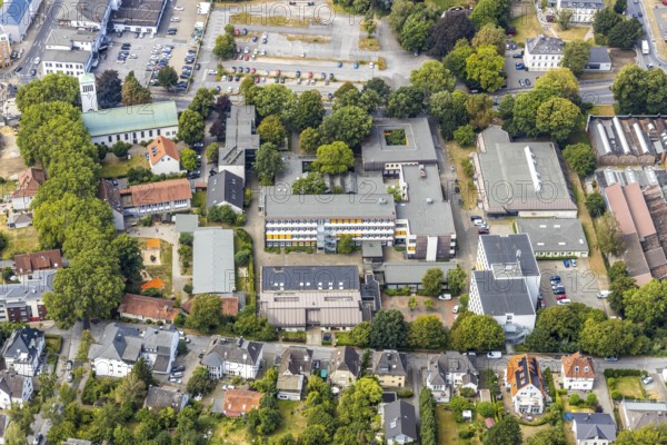 Aerial view, Hönne Berufskolleg, Kreissporthalle Menden, Kath. Kirche St. Walburgis, Menden, Sauerland, Märkischer Kreis, North Rhine-Westphalia, Germany, place of worship, vocational school, education, educational institution, DE, Europe, commercial area, religious community, church, parish, denomination, educational institute, aerial view, aerial photography, aerial photography, religion, school, sports, sports hall, overview, bird's-eye view, Werler Straße, birds-eyes view, overview
