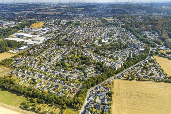 Aerial view, local view Platte Heide, meadows and fields, Menden, Sauerland, Märkischer Kreis, North Rhine-Westphalia, Germany, retirement home, old people's home, retirement home, place of worship, care and nursing, education, educational institution, Bonifatiusschule, DE, DHL Freight, Europe, freight forwarding service, Platte Heide Community Primary School, religious community, place of worship, freight transport, Jochen-Klepper-Haus, church, parish, denomination, educational institute, logistics, logistics service, logistics service provider, logistics provider, aerial photography, aerial photography, care facility, care home, religion, school, retirement home, retirement residence, retirement home, retirement centre, forwarding agency, sports hall Bonifatiusschule Platte Heide, transport, transport service, overview, bird's-eye view, birds-eyes view, cath. Church of St Mary, overview