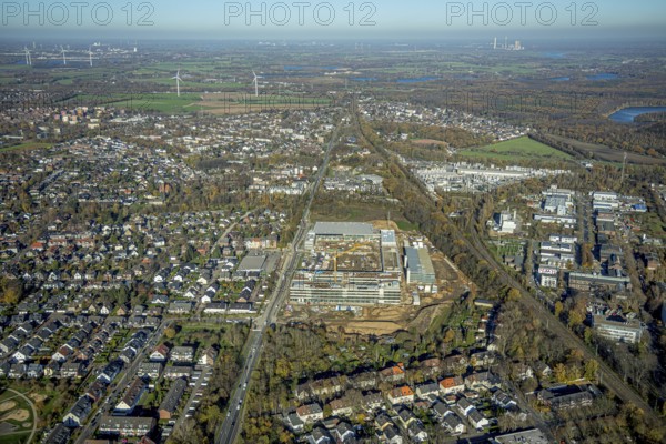 Aerial view, construction site, new Edeka headquarters, Rheinberger Straße, Rheinkamp-Utfort, Mörs, Ruhr area, North Rhine-Westphalia, Germany, construction work, construction, construction area, building site, building plots, construction project, construction site, DE, Edeka Markt, Europe, aerial view, aerial photography, aerial photography, new building, overview, administration, bird's eye view, birds-eyes view, overview