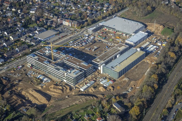 Aerial view, construction site, new Edeka headquarters, Rheinberger Straße, Rheinkamp-Utfort, Mörs, Ruhr area, North Rhine-Westphalia, Germany, construction work, construction, construction area, building site, building plots, construction project, construction site, DE, Edeka Markt, Europe, aerial view, aerial photography, aerial photography, new building, overview, administration, bird's eye view, birds-eyes view, overview