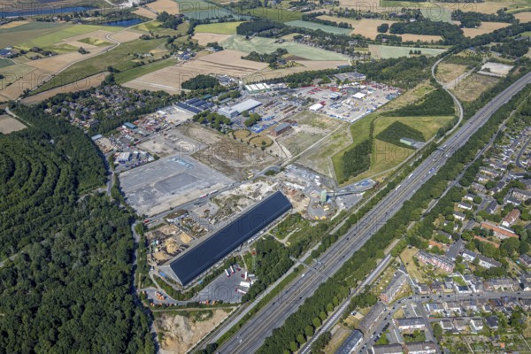 Aerial view, motorway A42, Am Pattberg, old water tower Pattberg colliery, Gedbäude mit solar roof, Mörs, Ruhr area, North Rhine-Westphalia, Germany, DE, Europe, birds-eyes, view, aerial photograph, aerial photography, aerial photography, overview, overview, bird's eye view, transport, traffic, infrastructure, logistics, road traffic, energy, solar energy, power plant, electricity, power supply, electricity, photovoltaics, regenerative