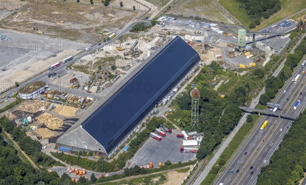 Aerial view, motorway A42, Am Pattberg, old water tower Pattberg colliery, Gedbäude mit solar roof, Mörs, Ruhr area, North Rhine-Westphalia, Germany, DE, Europe, birds-eyes, view, aerial photograph, aerial photography, aerial photography, overview, overview, bird's eye view, transport, traffic, infrastructure, logistics, road traffic, energy, solar energy, power plant, electricity, power supply, electricity, photovoltaics, regenerative