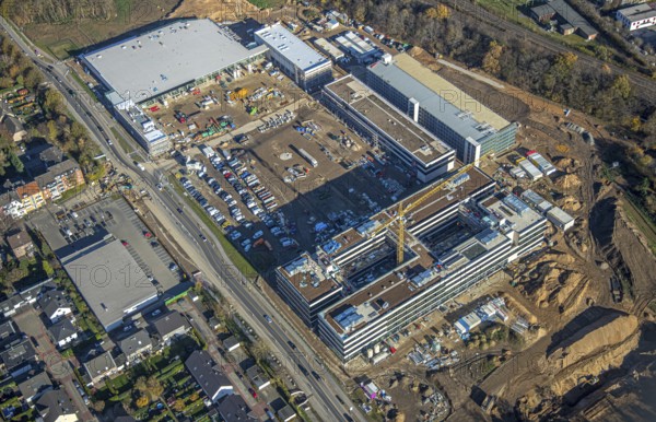 Aerial view, construction site, new Edeka headquarters, Rheinberger Straße, Rheinkamp-Utfort, Mörs, Ruhr area, North Rhine-Westphalia, Germany, construction work, construction, construction area, building site, building plots, construction project, construction site, DE, Edeka Markt, Europe, aerial view, aerial photography, aerial photography, new building, overview, administration, bird's eye view, birds-eyes view, overview