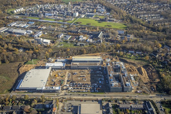 Aerial view, construction site, new Edeka headquarters, Rheinberger Straße, Rheinkamp-Utfort, Mörs, Ruhr area, North Rhine-Westphalia, Germany, construction work, construction, construction area, building site, building plots, construction project, construction site, DE, Edeka Markt, Europe, aerial view, aerial photography, aerial photography, new building, overview, administration, bird's eye view, birds-eyes view, overview