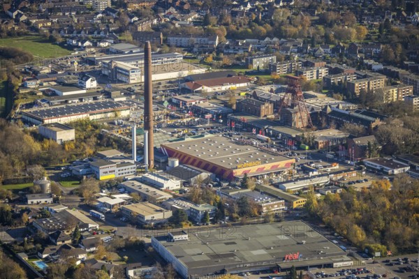 Aerial view, industrial area Rheinpreußenpark, former colliery Rheinpreußen, Moers-Hochstraß, Mörs, Ruhr area, North Rhine-Westphalia, Germany, DE, Europe, winding tower, commercial enterprises, commercial area, commercial park, commercial location, commercial use, Hornbach Baumarkt, industrial area, industrial building, industrial location, aerial photograph, aerial photography, aerial photography, tower, overview, bird's eye view, Zechenstraße, birds-eyes view, historical place, overview
