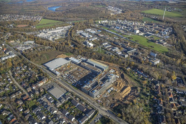 Aerial view, construction site, new Edeka headquarters, Rheinberger Straße, Rheinkamp-Utfort, Mörs, Ruhr area, North Rhine-Westphalia, Germany, construction work, construction, construction area, building site, building plots, construction project, construction site, DE, Edeka Markt, Europe, aerial view, aerial photography, aerial photography, new building, overview, administration, bird's eye view, birds-eyes view, overview