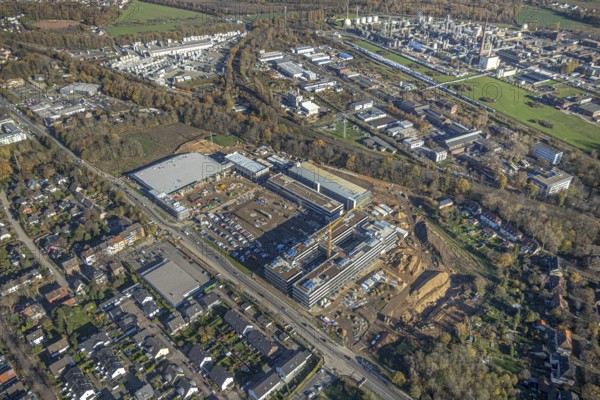 Aerial view, construction site, new Edeka headquarters, Rheinberger Straße, Rheinkamp-Utfort, Mörs, Ruhr area, North Rhine-Westphalia, Germany, construction work, construction, construction area, building site, building plots, construction project, construction site, DE, Edeka Markt, Europe, aerial view, aerial photography, aerial photography, new building, overview, administration, bird's eye view, birds-eyes view, overview