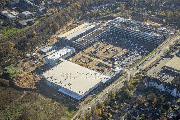 Aerial view, construction site, new Edeka headquarters, Rheinberger Straße, Rheinkamp-Utfort, Mörs, Ruhr area, North Rhine-Westphalia, Germany, construction work, construction, construction area, building site, building plots, construction project, construction site, DE, Edeka Markt, Europe, aerial view, aerial photography, aerial photography, new building, overview, administration, bird's eye view, birds-eyes view, overview