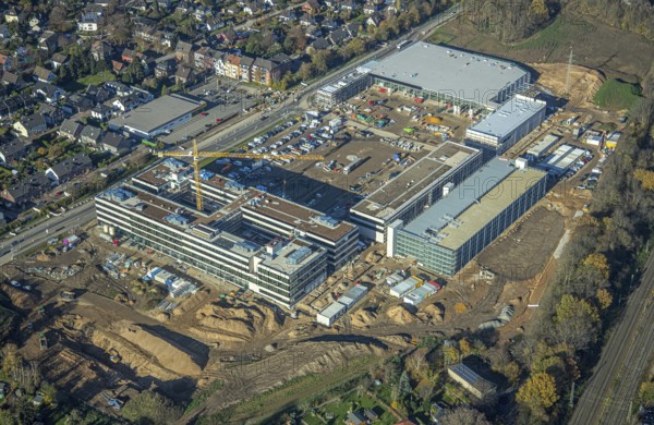 Aerial view, construction site, new Edeka headquarters, Rheinberger Straße, Rheinkamp-Utfort, Mörs, Ruhr area, North Rhine-Westphalia, Germany, construction work, construction, construction area, building site, building plots, construction project, construction site, DE, Edeka Markt, Europe, aerial view, aerial photography, aerial photography, new building, overview, administration, bird's eye view, birds-eyes view, overview