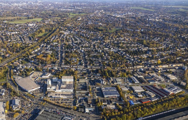 Aerial view, industrial area Dümpten, Mannesmannallee, motorway A40, Dümpten - West, Mülheim an der Ruhr, Ruhr area, North Rhine-Westphalia, Germany, Aldi supermarket, Aldi Süd, DE, Europe, commercial enterprises, commercial area, commercial park, commercial location, commercial use, property tax, real estate, industrial area, industrial building, industrial site, aerial view, aerial photography, aerial photography, apartment buildings, metro, apartment buildings, photovoltaic, photovoltaic system, solar, solar system, solar energy, solar energy, overview, bird's-eye view, residential complex, living and living, residential area, residential buildings, birds-eyes view, overview