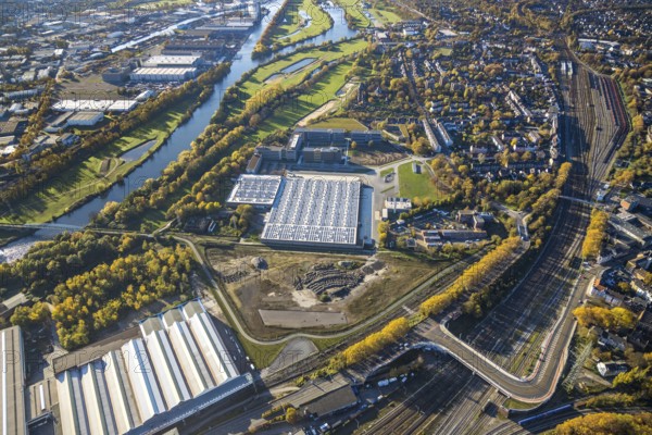 Aerial view, Aldi Süd, open space, construction area, river Ruhr, Styrum - Süd, Mülheim an der Ruhr, Ruhr area, North Rhine-Westphalia, Germany, Burgstraße, DE, Europe, commercial enterprises, commercial area, commercial park, commercial location, commercial use, industrial area, industrial building, industrial location, aerial view, aerial photography, aerial photography, photovoltaic, photovoltaic plant, solar, solar plant, solar energy, solar energy, overview, bird's eye view, birds-eyes view, overview