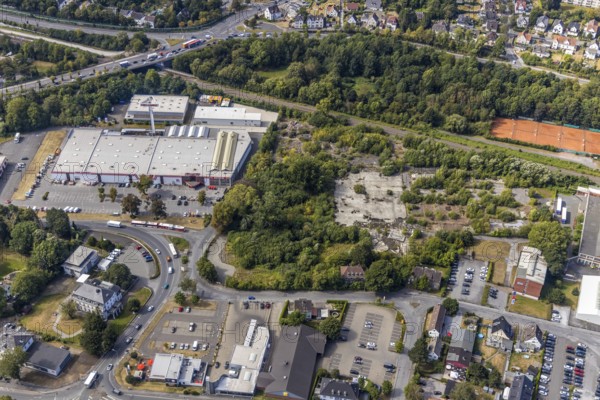 Aerial view, Evidal site, Carl-Benz-Straße construction area, Hellweg Baumarkt, Menden, Sauerland, Märkischer Kreis, North Rhine-Westphalia, Germany, railway tracks, construction area, construction site, building plots, construction project, construction site, DE, Europe, commercial enterprises, commercial area, commercial site, commercial use, industrial area, industrial site, aerial photograph, aerial photography, aerial photography, overview, bird's eye view, birds-eyes view, overview