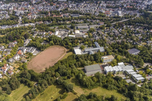 Aerial view, Windthorststraße school centre, Städt. Comprehensive school Menden, school Am Gelben Morgen, municipal secondary school Menden, sports hall, sports field Gisbert-Kranz-Platz, Menden, Sauerland, Märkischer Kreis, North Rhine-Westphalia, Germany, education, educational institution, DE, Europe, fire station and rescue station Menden, football pitch, comprehensive school, secondary school, teaching institute, aerial view, aerial photography, aerial photography, secondary school, school, sports, sports facilities, sports field, sports facility, overview, bird's eye view, bird's eye view, overview