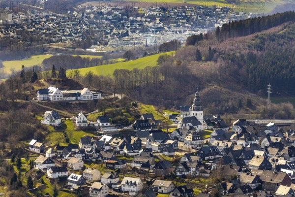Aerial view, view of Eversberg, Eversberg Castle ruins, Eversberg Castle Hall, St.Johannes-Evangelist-Kirche, Eversberg, Meschede, Sauerland, North Rhine-Westphalia, Germany, castle, DE, Europe, half-timbered houses, religious community, place of worship, property tax, real estate, church, parish, denomination, aerial view, aerial photography, aerial photography, Arnsberg Forest nature park Park, religion, ruins, castle, castle hill, overview, event location, event venue, bird's-eye view, meadows and fields, residential area, housing and living, residential area, residential buildings, residential quality, residential neighbourhood, housing estate, bird's-eye view, cultural use, overview