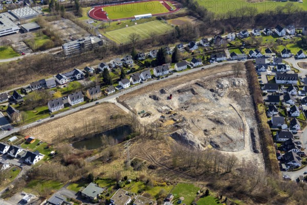 Aerial view, construction area residential development Waldstraße, former concrete plant Waldstraße, Meschede, Sauerland, North Rhine-Westphalia, Germany, construction work, construction vehicles, construction area, building site, building plots, construction measure, construction project, construction site, DE, development, Europe, property tax, real estate, capacity requirement, aerial photograph, aerial photography, aerial photography, overview, bird's eye view, residential complex, living and living, residential area, residential buildings, residential quality, residential neighbourhood, housing estate, birds-eyes view, overview