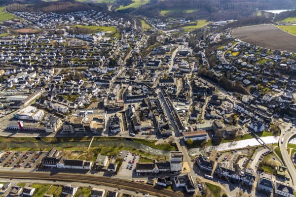 Aerial view, city centre view, river Ruhr, Coventry bridge, citizens' office Meschede, catholic parish church St. Walburga, Meschede, Sauerland, North Rhine-Westphalia, Germany, place of worship, district administration, bridge, citizens' office, city, DE, shopping centre, Europe, volunteer fire brigade city of Meschede, religious community, place of worship, property tax, real estate, city centre, church, parish, denomination, aerial view, aerial photography, aerial photography, apartment buildings, apartment buildings, local view, religion, Ruhrstraße, townscape, city area, city administration, city centre, overview, bird's-eye view, residential complex, living and life, residential area, residential buildings, birds-eyes view, overview