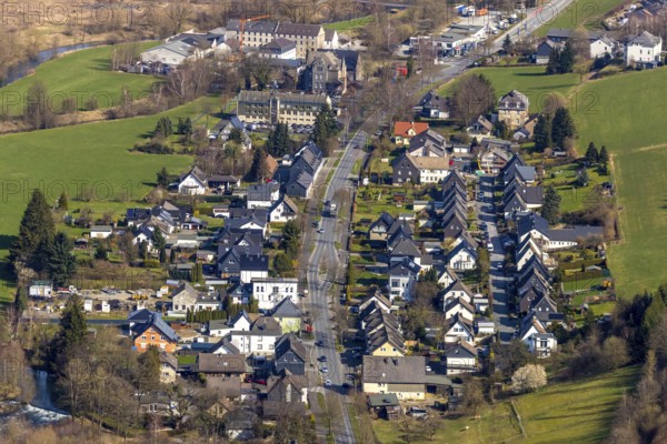 Aerial view, district Heinrichsthal, Meschede, Sauerland, North Rhine-Westphalia, Germany, DE, Europe, commercial buildings, commercial enterprises, commercial area, commercial area, commercial location, commercial use, property tax, HST Systemtechnik, Heinrichsthaler Straße, real estate, aerial view, aerial photography, aerial photography, terraced houses, overview, bird's-eye view, residential area, living and life, residential area, residential buildings, housing estate, birds-eyes view, overview