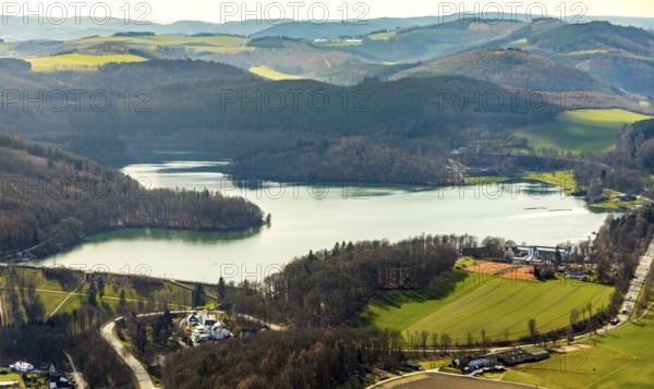 Aerial view, Hennetalsperre, Hennesee, forest area, Meschede, Sauerland, North Rhine-Westphalia, Germany, DE, food and drink, Europe, distant view, shapes and colours, gastronomy, Hennedamm, hotel, hotel facilities, hotel industry, hilly landscape, landscape panorama, aerial view, aerial photography, aerial photography, mixed forest, coniferous forest, sport, dam wall, reservoir, dam, tennis, tennis facility, tennis courts, overview, bird's-eye view, forest, forest dieback, Welcome Hotel Meschede/Hennesee, birds-eyes view, overview