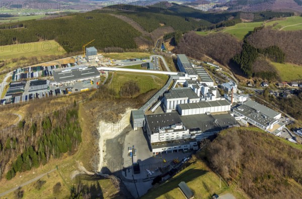 Aerial view, Brewery C.& A. VELTINS GmbH & Co. KG, new high-bay warehouse, Grevenstein, Meschede, Sauerland, North Rhine-Westphalia, Germany, An der Streue, construction work, construction site, construction crane, construction measure, construction project, construction site, brewery, DE, Europe, beverage manufacturer, hilly landscape, capacity requirement, aerial view, aerial photography, aerial photography, new building, overview, Veltins, bird's eye view, forest area, meadows and fields, bird's eye view, overview
