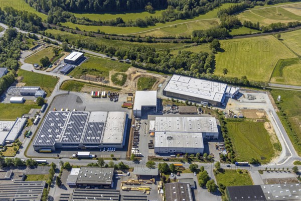 Aerial view, industrial park Enste Nord, Meschede, Sauerland, North Rhine-Westphalia, Germany, motorway A46, motorway junction Enste, DE, Europe, commercial enterprises, commercial area, commercial park, commercial location, commercial use, Hochsauerlandkreis, industrial area, industrial location, aerial view, aerial photography, aerial photography, photovoltaics, photovoltaic system, solar, solar system, solar energy, solar park Enste, overview, bird's-eye view, birds-eyes view, overview