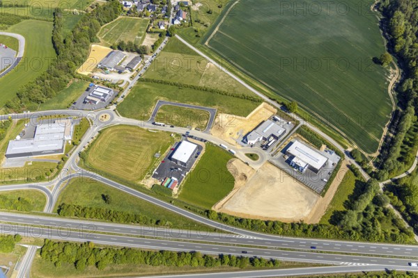 Aerial view, industrial park Enste Nord, Meschede, Sauerland, North Rhine-Westphalia, Germany, motorway A46, motorway junction Enste, DE, Europe, commercial enterprises, commercial area, commercial park, commercial location, commercial use, Hochsauerlandkreis, industrial area, industrial location, aerial view, aerial photography, aerial photography, photovoltaics, photovoltaic system, solar, solar system, solar energy, solar park Enste, overview, bird's-eye view, birds-eyes view, overview