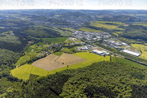 Aerial view, industrial estate Enste Nord, new building logistics centre Briloner Leuchten GmbH, Meschede, Sauerland, North Rhine-Westphalia, Germany, motorway A46, motorway junction Enste, DE, Europe, commercial enterprises, commercial area, industrial estate, commercial park, commercial location, commercial use, Hochsauerlandkreis, industrial area, industrial location, aerial view, aerial photography, aerial photography, solar park Enste, overview, bird's-eye view, overview