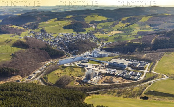 Aerial view, View of Grevenstein, Brewery C.& A. VELTINS GmbH & Co. KG, new high-bay warehouse, Grevenstein, Meschede, Sauerland, North Rhine-Westphalia, Germany, An der Streue, construction work, construction site, construction crane, construction measure, construction project, construction site, brewery, DE, Europe, beverage manufacturer, property tax, hilly landscape, real estate, capacity requirement, aerial view, aerial photography, aerial photography, new building, overview, Veltins, bird's-eye view, forest area, meadows and fields, housing estate, living and living, residential area, residential buildings, quality of living, birds-eyes view, overview