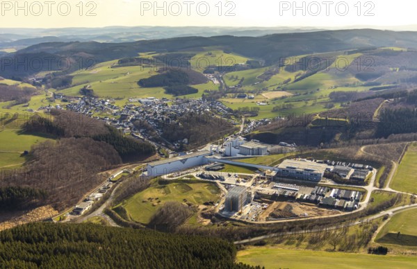 Aerial view, View of Grevenstein, Brewery C.& A. VELTINS GmbH & Co. KG, new high-bay warehouse, Grevenstein, Meschede, Sauerland, North Rhine-Westphalia, Germany, An der Streue, construction work, construction site, construction crane, construction measure, construction project, construction site, brewery, DE, Europe, beverage manufacturer, property tax, hilly landscape, real estate, capacity requirement, aerial view, aerial photography, aerial photography, new building, overview, Veltins, bird's-eye view, forest area, meadows and fields, housing estate, living and living, residential area, residential buildings, quality of living, birds-eyes view, overview