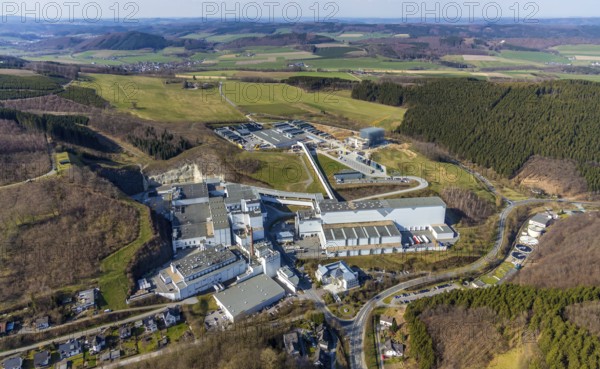 Aerial view, Brewery C.& A. VELTINS GmbH & Co. KG, new high-bay warehouse, Grevenstein, Meschede, Sauerland, North Rhine-Westphalia, Germany, An der Streue, construction work, construction site, construction crane, construction measure, construction project, construction site, brewery, DE, Europe, beverage manufacturer, hilly landscape, capacity requirement, aerial view, aerial photography, aerial photography, new building, overview, Veltins, bird's eye view, forest area, meadows and fields, bird's eye view, overview