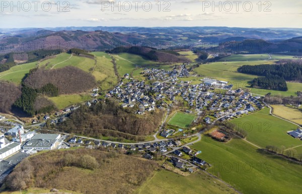 Aerial view, local view Grevenstein, brewery C.& A. VELTINS GmbH & Co. KG, Grevenstein, Meschede, Sauerland, North Rhine-Westphalia, Germany, An der Streue, brewery, DE, Europe, football pitch, football stadium, beverage manufacturer, property tax, hilly landscape, real estate, aerial view, aerial photography, aerial photography, sports, sports facilities, sports field, sports facility, stadium, tennis, tennis facility, tennis courts, overview, Veltins, bird's-eye view, wooded area, meadows and fields, residential area, living and life, residential area, residential buildings, residential quality, birds-eyes view, overview