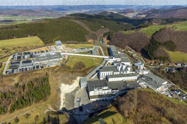 Aerial view, Brewery C.& A. VELTINS GmbH & Co. KG, new high-bay warehouse, Grevenstein, Meschede, Sauerland, North Rhine-Westphalia, Germany, An der Streue, construction work, construction site, construction crane, construction measure, construction project, construction site, brewery, DE, Europe, beverage manufacturer, hilly landscape, capacity requirement, aerial view, aerial photography, aerial photography, new building, overview, Veltins, bird's eye view, forest area, meadows and fields, bird's eye view, overview