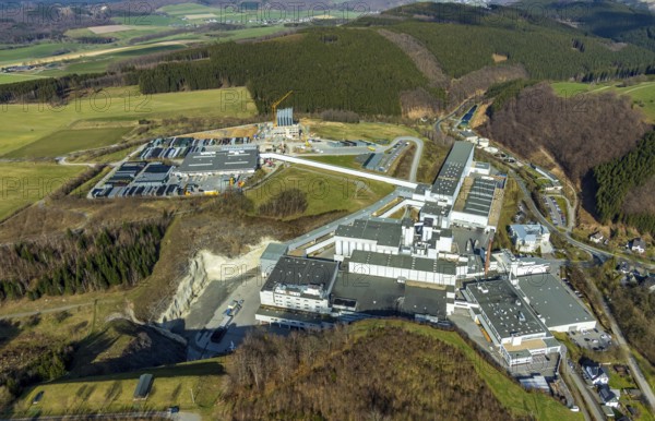 Aerial view, Brewery C.& A. VELTINS GmbH & Co. KG, new high-bay warehouse, Grevenstein, Meschede, Sauerland, North Rhine-Westphalia, Germany, An der Streue, construction work, construction site, construction crane, construction measure, construction project, construction site, brewery, DE, Europe, beverage manufacturer, hilly landscape, capacity requirement, aerial view, aerial photography, aerial photography, new building, overview, Veltins, bird's eye view, forest area, meadows and fields, bird's eye view, overview