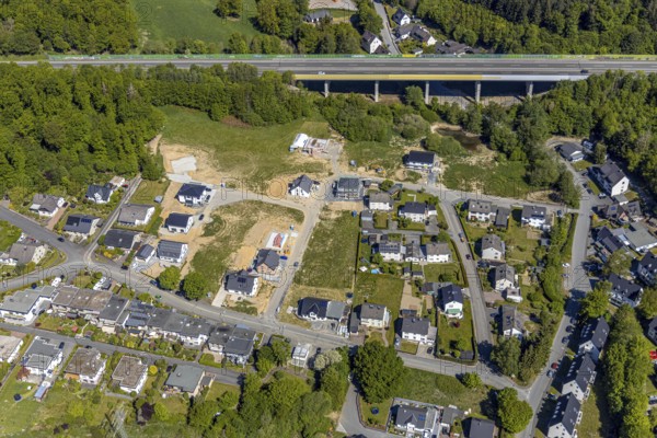 Aerial view, aerial view Meschede North, bridge of the motorway A46, construction site, Meschede, Sauerland, North Rhine-Westphalia, Germany, construction area, construction site, building plots, DE, single-family houses, Europe, football pitch, property tax, Hochsauerlandkreis, real estate, aerial view, aerial photography, aerial photography, apartment buildings, terraced houses, overview, bird's-eye view, residential complex, living and living, residential area, residential buildings, residential quarter, housing estate, birds-eyes view, overview
