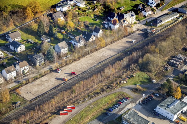 Aerial view, aerial view Wennemen, industrial area Im Ruhr Valley, railway station, goods station Wennemen, open space Südstraße, Meschede, Sauerland, North Rhine-Westphalia, Germany, railway tracks, DE, single-family houses, Europe, distant view, property tax, real estate, aerial view, aerial photography, aerial photography, overview, bird's-eye view, living and life, residential buildings, housing estate, birds-eyes view, overview