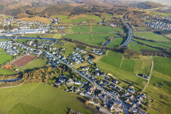 Aerial view, sports field and district Olpe, river Ruhr, motorway A46 with tunnel passage, local view, house Bethanien, Freienohler Straße, Olpe, Meschede, Sauerland, North Rhine-Westphalia, Germany, motorway bridge of the A46 crosses the river Ruhr, DE, single-family houses, Europe, Freienohler Straße crosses the river Ruhr, property tax, real estate, aerial view, aerial photography, aerial photography, Olpe district, tunnel passage, tunnel entrance of the motorway near Olpe, overview, bird's eye view, meadows and fields, living and life, residential buildings, residential quality, housing estate, birds-eyes view, overview