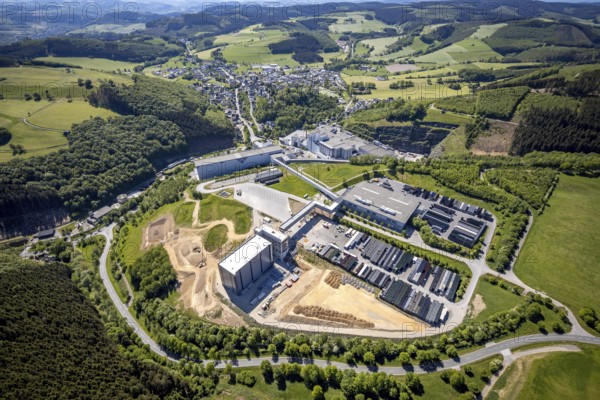 Aerial view, Brewery C.& A. VELTINS GmbH & Co. KG, new construction high-bay warehouse, Grevenstein, Meschede, Sauerland, North Rhine-Westphalia, Germany, An der Streue, construction work, construction site, construction crane, construction measure, construction project, construction site, brewery, DE, Europe, beverage manufacturer, Hochsauerlandkreis, hilly landscape, capacity requirement, aerial view, aerial photography, aerial photography, new construction, overview, Veltins, bird's-eye view, forest area, meadows and fields, birds-eyes view, overview
