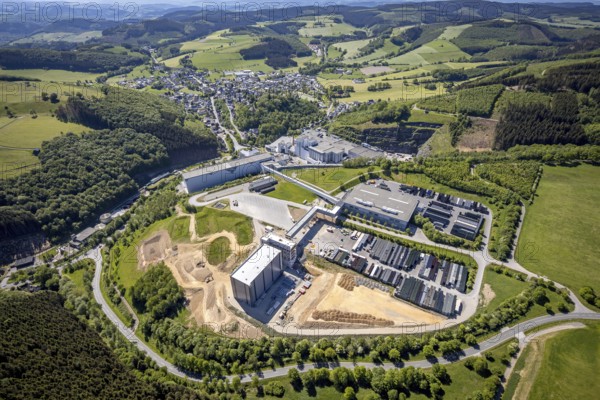 Aerial view, Brewery C.& A. VELTINS GmbH & Co. KG, new construction high-bay warehouse, Grevenstein, Meschede, Sauerland, North Rhine-Westphalia, Germany, An der Streue, construction work, construction site, construction crane, construction measure, construction project, construction site, brewery, DE, Europe, beverage manufacturer, Hochsauerlandkreis, hilly landscape, capacity requirement, aerial view, aerial photography, aerial photography, new construction, overview, Veltins, bird's-eye view, forest area, meadows and fields, birds-eyes view, overview