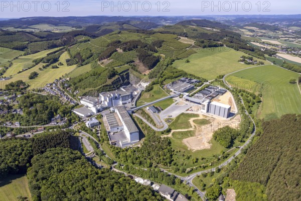 Aerial view, Brewery C.& A. VELTINS GmbH & Co. KG, new construction high-bay warehouse, Grevenstein, Meschede, Sauerland, North Rhine-Westphalia, Germany, An der Streue, construction work, construction site, construction crane, construction measure, construction project, construction site, brewery, DE, Europe, beverage manufacturer, Hochsauerlandkreis, hilly landscape, capacity requirement, aerial view, aerial photography, aerial photography, new construction, overview, Veltins, bird's-eye view, forest area, meadows and fields, birds-eyes view, overview