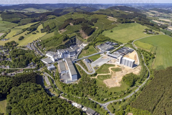 Aerial view, Brewery C.& A. VELTINS GmbH & Co. KG, new construction high-bay warehouse, Grevenstein, Meschede, Sauerland, North Rhine-Westphalia, Germany, An der Streue, construction work, construction site, construction crane, construction measure, construction project, construction site, brewery, DE, Europe, beverage manufacturer, Hochsauerlandkreis, hilly landscape, capacity requirement, aerial view, aerial photography, aerial photography, new construction, overview, Veltins, bird's-eye view, forest area, meadows and fields, birds-eyes view, overview