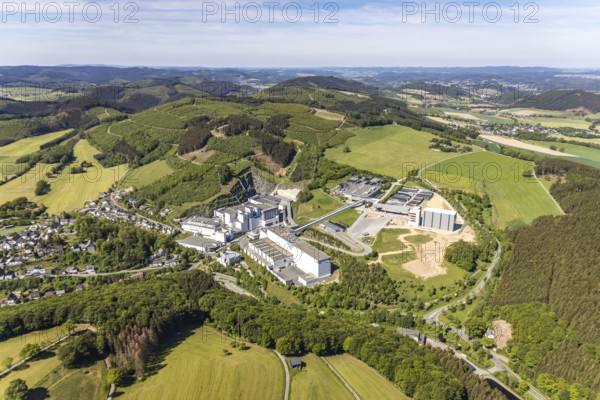 Aerial view, Brewery C.& A. VELTINS GmbH & Co. KG, new construction high-bay warehouse, Grevenstein, Meschede, Sauerland, North Rhine-Westphalia, Germany, An der Streue, construction work, construction site, construction crane, construction measure, construction project, construction site, brewery, DE, Europe, beverage manufacturer, Hochsauerlandkreis, hilly landscape, capacity requirement, aerial view, aerial photography, aerial photography, new construction, overview, Veltins, bird's-eye view, forest area, meadows and fields, birds-eyes view, overview