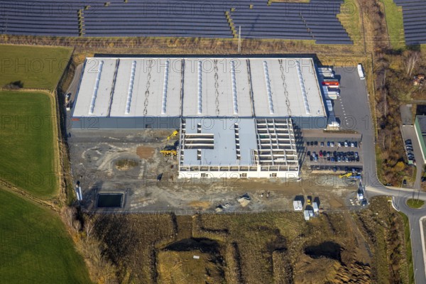 Aerial view, industrial estate Enste Nord, new construction logistics centre Briloner Leuchten, Meschede, Sauerland, North Rhine-Westphalia, Germany, expansion areas, motorway A46, construction work, construction area, building plots, construction measure, construction project, construction site, DE, Enster Straße, development, Europe, commercial area, commercial area, commercial use, industrial area, industrial site, capacity requirement, state road L743, aerial view, aerial photography, aerial photography, new construction, production plants, production halls, Stockhauser Straße, overview, bird's-eye view, bird's-eye view, overview