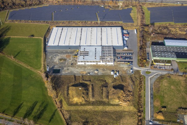Aerial view, industrial estate Enste Nord, new construction logistics centre Briloner Leuchten, Meschede, Sauerland, North Rhine-Westphalia, Germany, expansion areas, motorway A46, construction work, construction area, building plots, construction measure, construction project, construction site, DE, Enster Straße, development, Europe, commercial area, commercial area, commercial use, industrial area, industrial site, capacity requirement, state road L743, aerial view, aerial photography, aerial photography, new construction, production plants, production halls, Stockhauser Straße, overview, bird's-eye view, bird's-eye view, overview