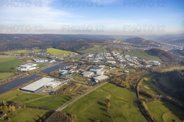 Aerial view, industrial estate Enste Nord, new construction logistics centre Briloner Leuchten, Meschede, Sauerland, North Rhine-Westphalia, Germany, expansion areas, motorway A46, construction work, construction area, building plots, construction measure, construction project, construction site, DE, Enster Straße, development, Europe, commercial area, commercial area, commercial use, industrial area, industrial site, capacity requirement, state road L743, aerial view, aerial photography, aerial photography, new construction, production plants, production halls, Stockhauser Straße, overview, bird's-eye view, bird's-eye view, overview