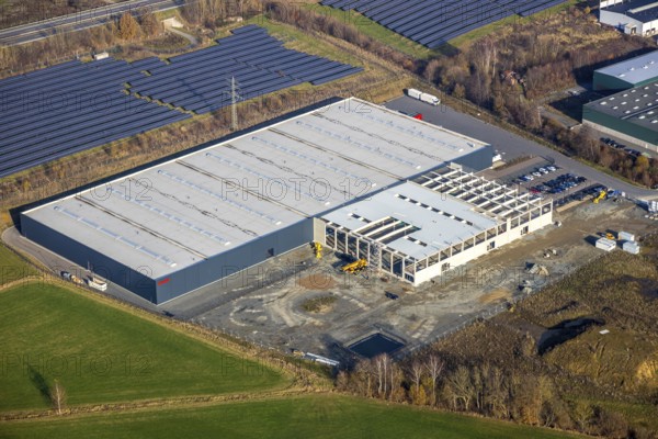 Aerial view, industrial estate Enste Nord, new construction logistics centre Briloner Leuchten, Meschede, Sauerland, North Rhine-Westphalia, Germany, expansion areas, motorway A46, construction work, construction area, building plots, construction measure, construction project, construction site, DE, Enster Straße, development, Europe, commercial area, commercial area, commercial use, industrial area, industrial site, capacity requirement, state road L743, aerial view, aerial photography, aerial photography, new construction, production plants, production halls, Stockhauser Straße, overview, bird's-eye view, bird's-eye view, overview