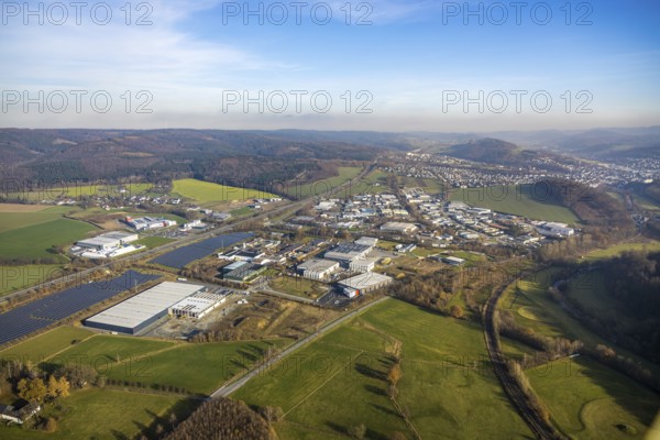 Aerial view, industrial estate Enste Nord, new construction logistics centre Briloner Leuchten, Meschede, Sauerland, North Rhine-Westphalia, Germany, expansion areas, motorway A46, construction work, construction area, building plots, construction measure, construction project, construction site, DE, Enster Straße, development, Europe, commercial area, commercial area, commercial use, industrial area, industrial site, capacity requirement, state road L743, aerial view, aerial photography, aerial photography, new construction, production plants, production halls, Stockhauser Straße, overview, bird's-eye view, bird's-eye view, overview