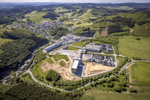 Aerial view, Brewery C.& A. VELTINS GmbH & Co. KG, new construction high-bay warehouse, Grevenstein, Meschede, Sauerland, North Rhine-Westphalia, Germany, An der Streue, construction work, construction site, construction crane, construction measure, construction project, construction site, brewery, DE, Europe, beverage manufacturer, Hochsauerlandkreis, hilly landscape, capacity requirement, aerial view, aerial photography, aerial photography, new construction, overview, Veltins, bird's-eye view, forest area, meadows and fields, birds-eyes view, overview