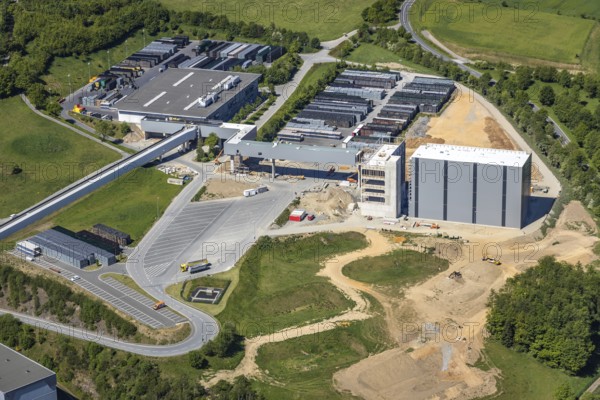 Aerial view, Brewery C.& A. VELTINS GmbH & Co. KG, new construction high-bay warehouse, Grevenstein, Meschede, Sauerland, North Rhine-Westphalia, Germany, An der Streue, construction work, construction site, construction crane, construction measure, construction project, construction site, brewery, DE, Europe, beverage manufacturer, Hochsauerlandkreis, hilly landscape, capacity requirement, aerial view, aerial photography, aerial photography, new construction, overview, Veltins, bird's-eye view, forest area, meadows and fields, birds-eyes view, overview