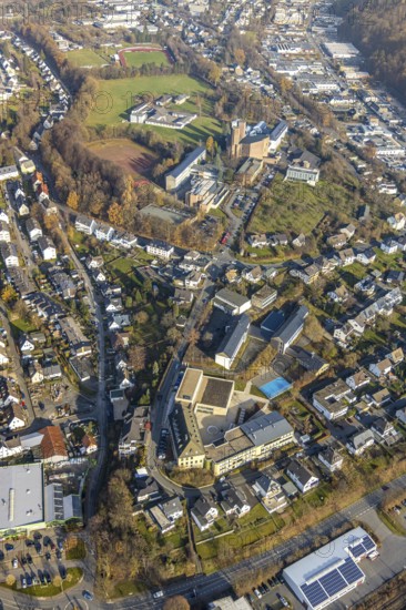 Aerial view, St. Walburga-Realschule, Kloster Abtei Königsmünster mit Gymnasium der Benediktiner, Klosterberg, Meschede-Stadt, Meschede, Sauerland, North Rhine-Westphalia, Germany, abbey, place of worship, education, educational institution, DE, Europe, religious community, place of worship, grammar school, house of silence, holy place, church, parish, monastery, denomination, aerial view, aerial photography, aerial photography, secondary school, religion, religious site, school, sports field, towers, overview, bird's-eye view, forest area, birds-eyes view, catholic church of the Assumption of the Blessed Virgin Mary Church of the Assumption of the Virgin Mary Meschede, overview
