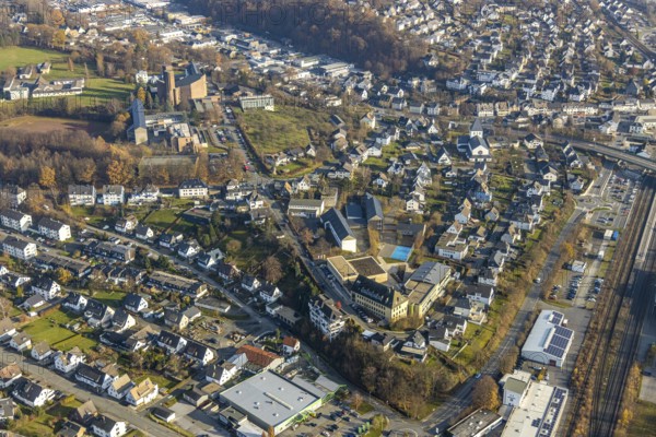 Aerial view, St. Walburga-Realschule, Kloster Abtei Königsmünster mit Gymnasium der Benediktiner, Klosterberg, Meschede-Stadt, Meschede, Sauerland, North Rhine-Westphalia, Germany, abbey, place of worship, education, educational institution, DE, Europe, religious community, place of worship, grammar school, house of silence, holy place, church, parish, monastery, denomination, aerial view, aerial photography, aerial photography, secondary school, religion, religious site, school, sports field, towers, overview, bird's-eye view, forest area, birds-eyes view, catholic church of the Assumption of the Blessed Virgin Mary Church of the Assumption of the Virgin Mary Meschede, overview