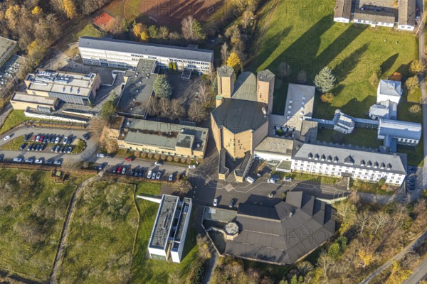 Aerial view, Königsmünster Abbey with Benedictine grammar school, House of Silence, Klosterberg, Meschede town, Meschede, Sauerland, North Rhine-Westphalia, Germany, abbey, place of worship, education, educational institution, DE, Europe, religious community, House of God, grammar school, holy place, church, parish, monastery, denomination, aerial view, aerial photography, aerial photography, religion, religious site, school, sports field, towers, overview, bird's-eye view, forest area, birds-eyes view, catholic church, church of the Assumption of the Blessed Virgin Mary Church of the Assumption of the Virgin Mary Meschede, overview